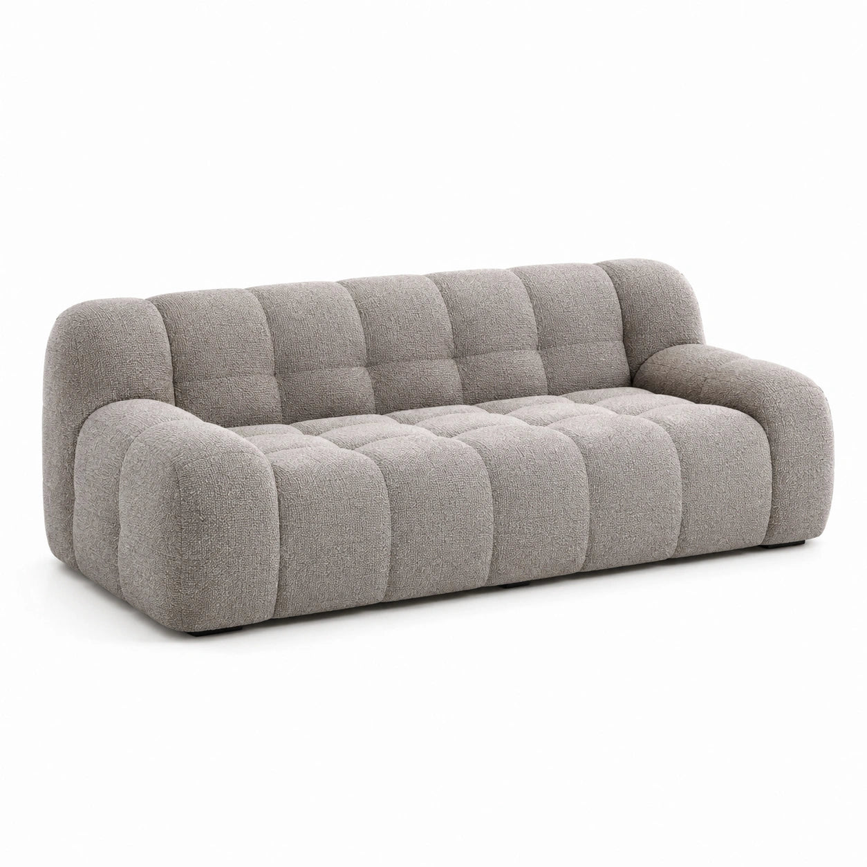 Sofá de tres plazas tapizado en boucle gris